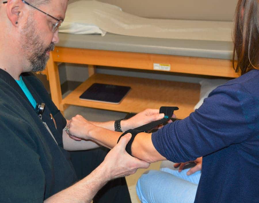 Southlake Orthopaedics doctor providing golfer's elbow treatment
